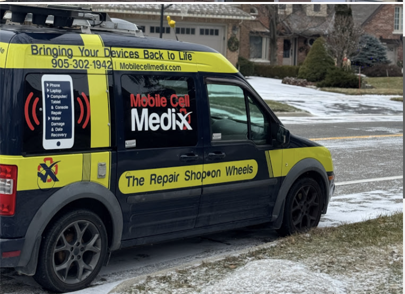 MobileCellMedix repair van arriving at a customer's home